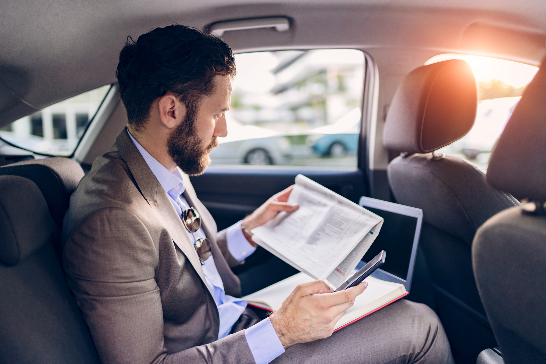 Business Executive Traveling by Car